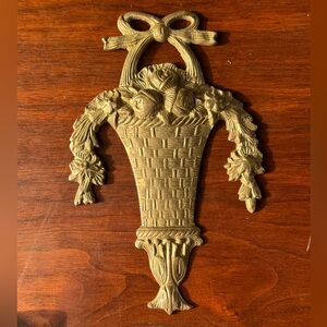 Vintage brass wall plaque decorated of Flowers in a basket